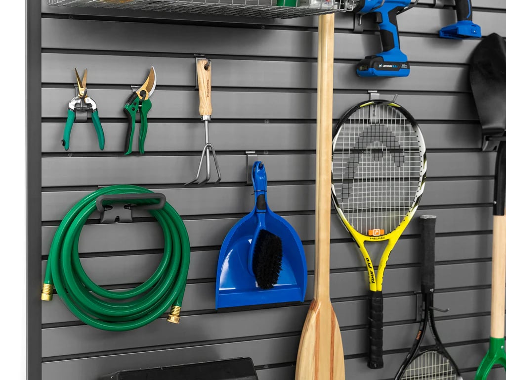 gardening and sports equipment on pvc slatwall