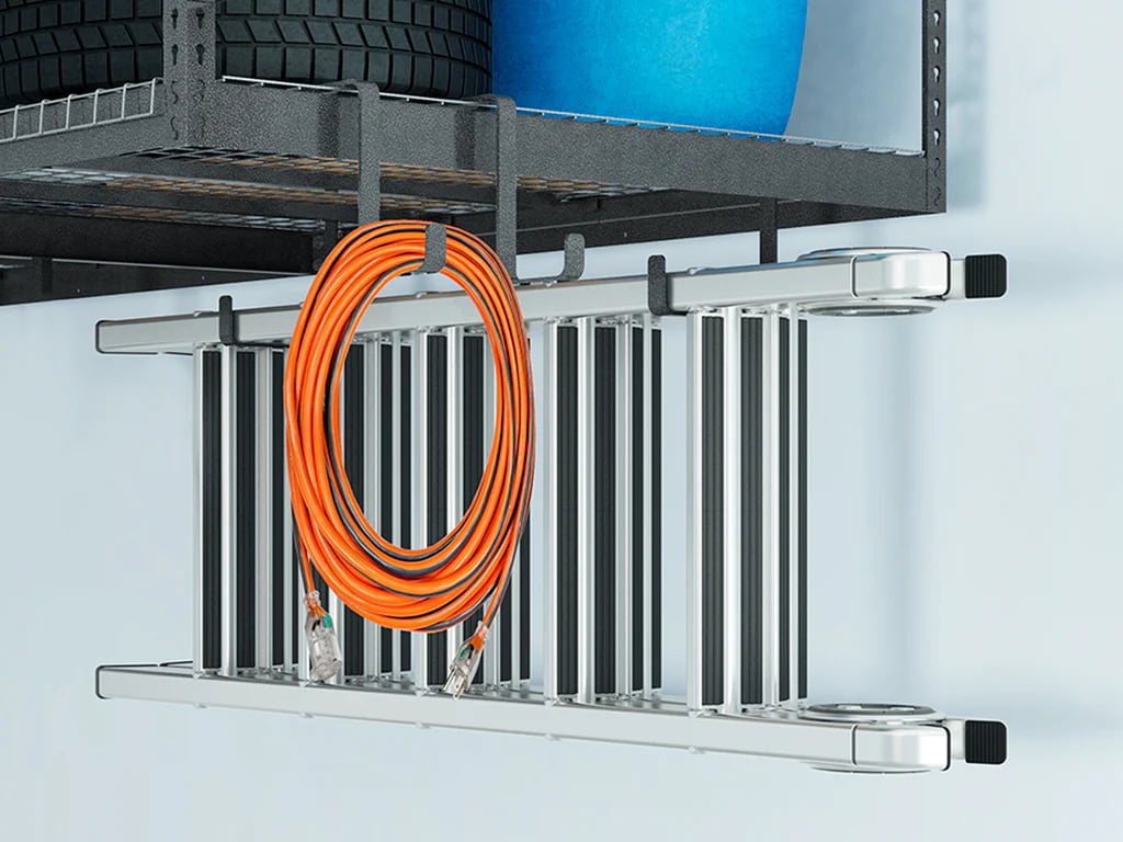 ladder and power cord hanging from storage rack hooks