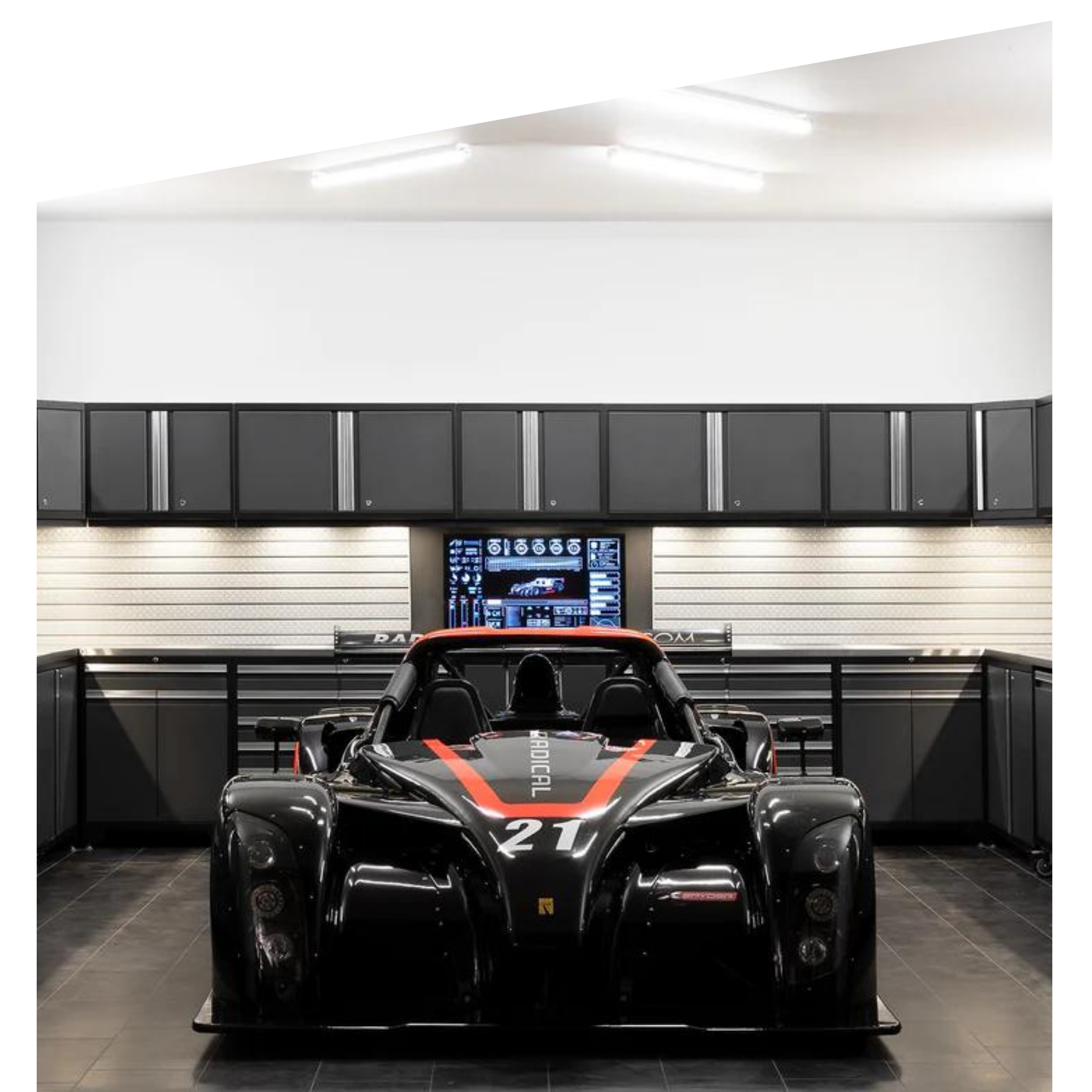 Modern dark garage with cabinets and sports car